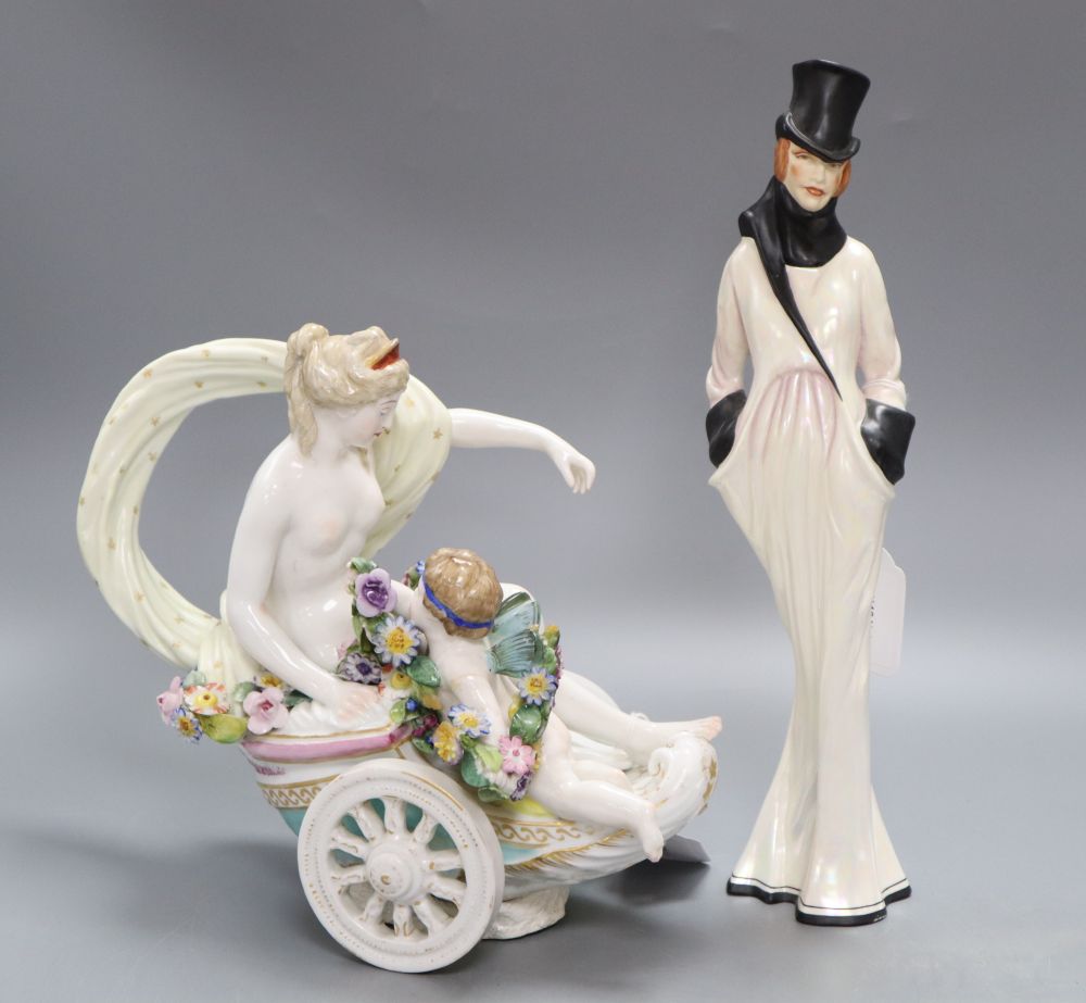 A Thuringian group of Venus and Cupid (some damage) and a Michael Sutty limited edition figure of an Art Deco style lady, tallest 33cm